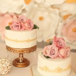 Soft palette for cakes with flower backdrop